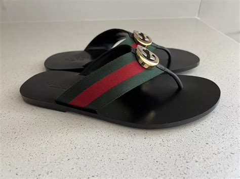 gucci flip flops meaning